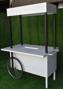 White carts for rent in Dubai, Abu Dhabi, Sharjah, Ajman, and the UAE, including candy carts, dessert carts, and rustic display carts.