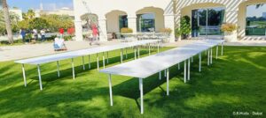 Setup of White Conference Meeting Tables for Event Rentals in Dubai, Sharjah, Abu Dhabi, Ajman, UAE