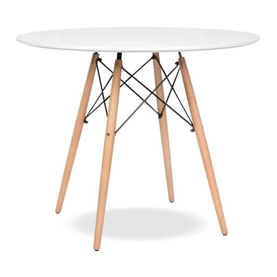 Scandinavian round dining table set up for an elegant event with minimalist design