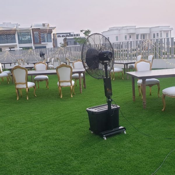 Eliza Gold Dior Chair, Mist Fan & Dark Majestic Table for Rent – Elegant Event Furniture and Cooling Solutions Available in Dubai, Abu Dhabi, Sharjah, and UAE