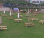 Picnic Table with Umbrella in Event Setup