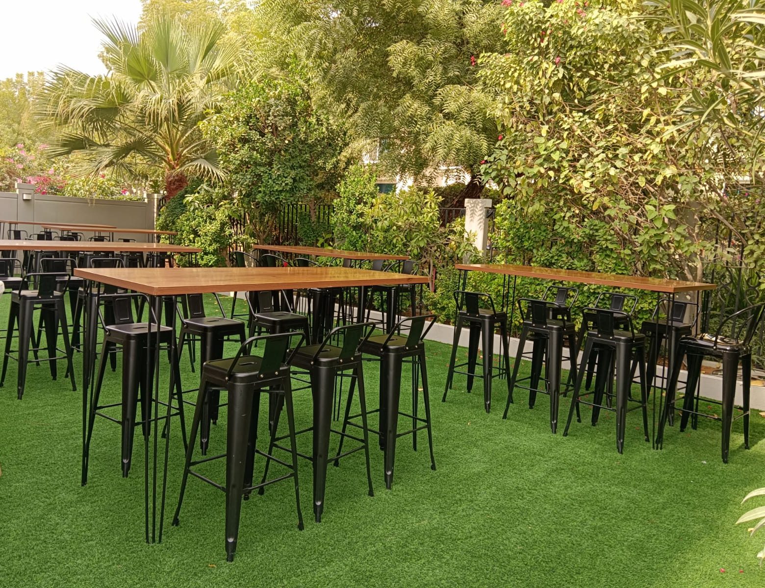 Wooden Top Hairpin Leg Cocktail Table and Black Tolix Bar Stool for Rent in Dubai and Abu Dhabi – Premium Event Furniture by Qamar