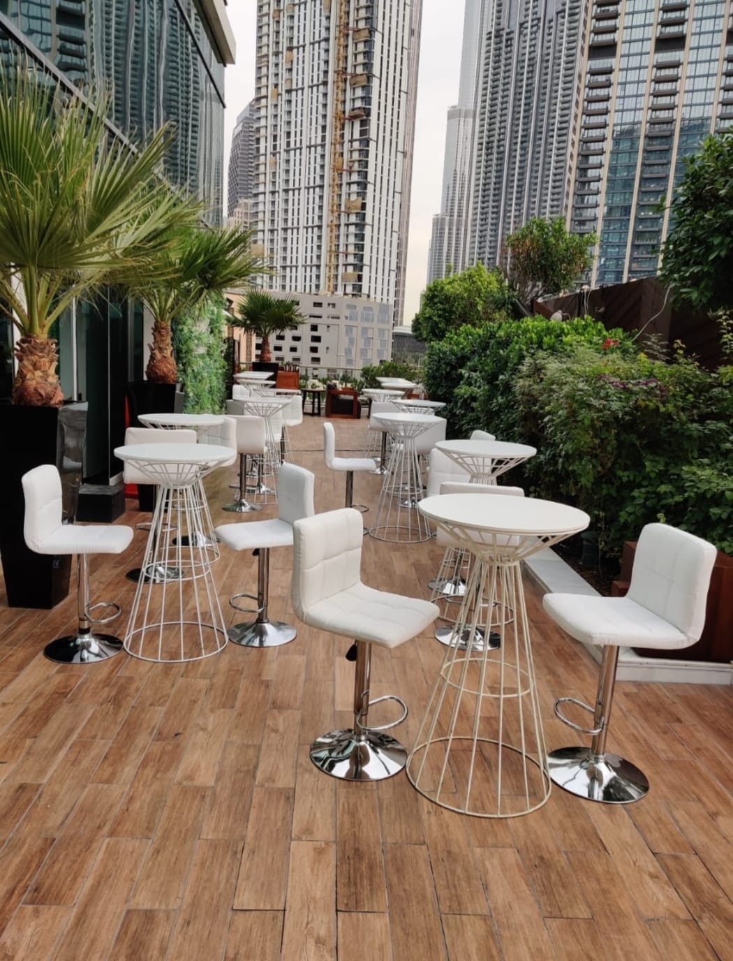 White Wire Bar Tables and Leather rexine White bar stools for rent | Qamar Event Rentals Dubai, UAE